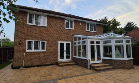 Beautifully maintained brick home with newly decorated conservatory and fresh exterior finish by Lord Heart Decorating Services
