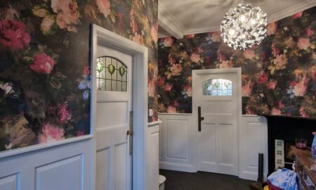 Striking wallpaper design applied as part of an interior decorating project in London by Lord Hart Decorating