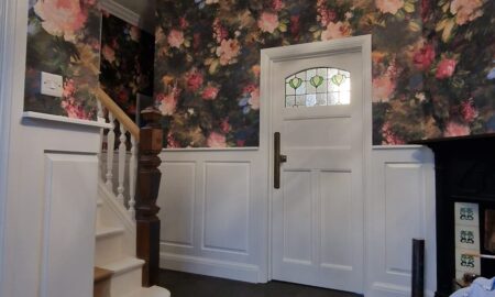 Striking wallpaper design applied as part of an interior decorating project in London by Lord Hart Decorating
