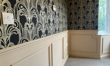 Interior space with bold wallpaper and expertly sprayed woodwork in Great Dunmow, Essex by Lord Hart Decorating