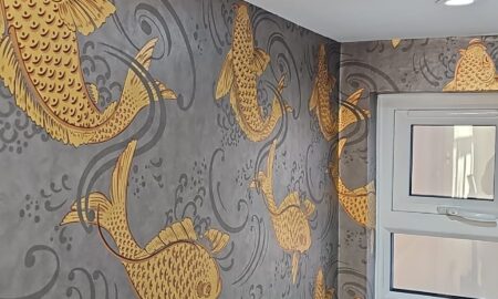 Decorated bathroom with sprayed woodwork panelling and feature wallpaper in Potters Bar, Hertfordshire by Lord Hart Decorating