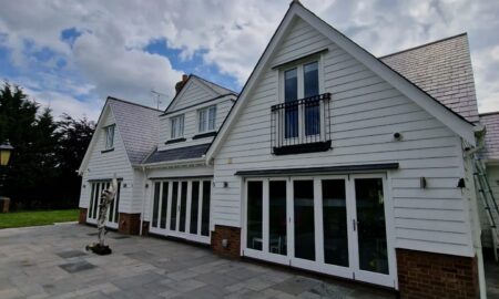Beautifully decorated white exterior of a large family home in Little Waltham, Chelmsford by Lord Hart Decorating