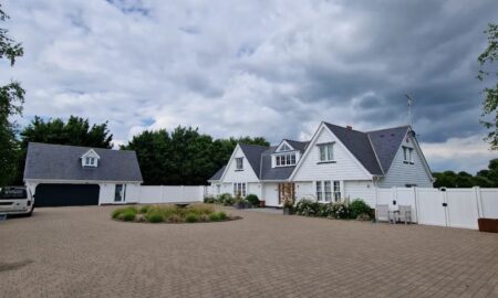 Beautifully decorated white exterior of a large family home in Little Waltham, Chelmsford by Lord Hart Decorating